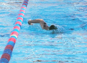 Susan Dawson-Cook swimming in the Tucson Triathlon